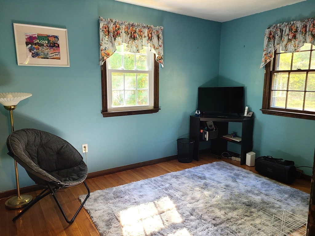 131 Holly Ridge Drive Hanson, MA 02341 - Photo 15 of 36 a bedroom with a bed and a window