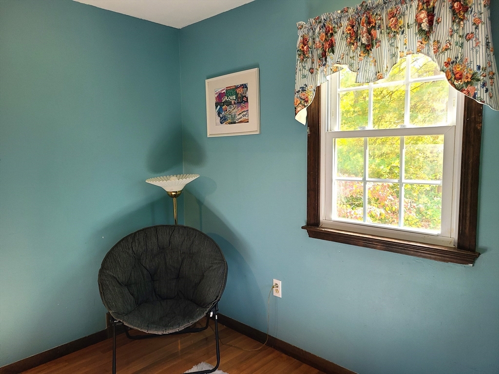 131 Holly Ridge Drive Hanson, MA 02341 - Photo 16 of 36 a lamp on a table in a room