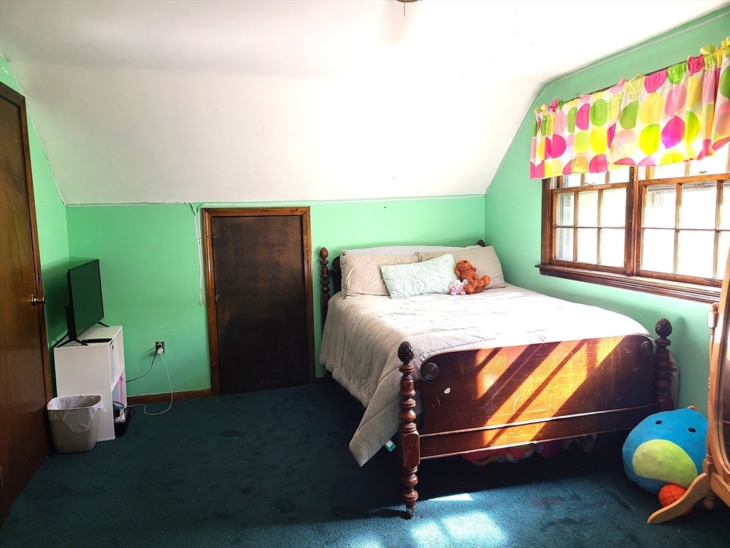 131 Holly Ridge Drive Hanson, MA 02341 - Photo 20 of 36 a bedroom with a bed and a window