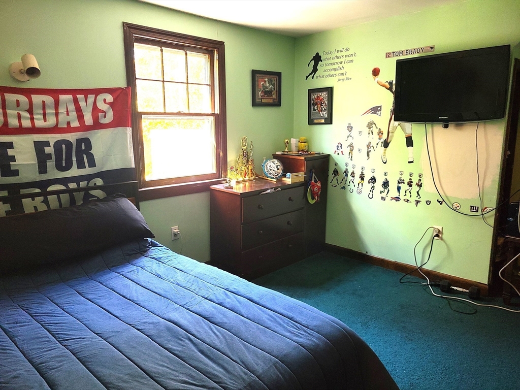 131 Holly Ridge Drive Hanson, MA 02341 - Photo 24 of 36 a bed room with furniture and a window