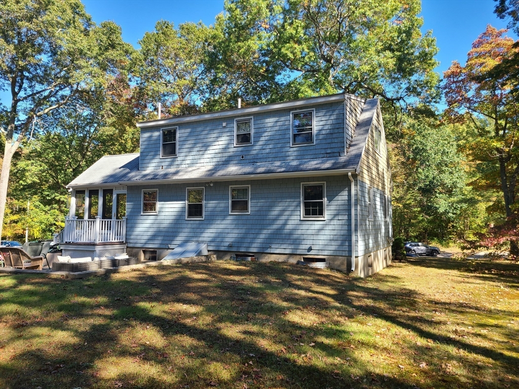 131 Holly Ridge Drive Hanson, MA 02341 - Photo 27 of 36 a front view of a house with a yard