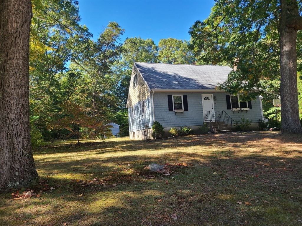 131 Holly Ridge Drive Hanson, MA 02341 - Photo 28 of 36 a view of a house with a yard