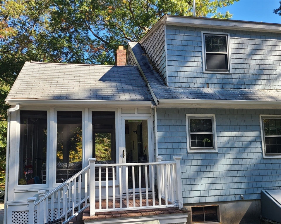 131 Holly Ridge Drive Hanson, MA 02341 - Photo 30 of 36 a view of house with deck and outdoor space