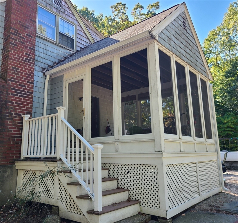 131 Holly Ridge Drive Hanson, MA 02341 - Photo 31 of 36 a view of a house with porch and wooden fence