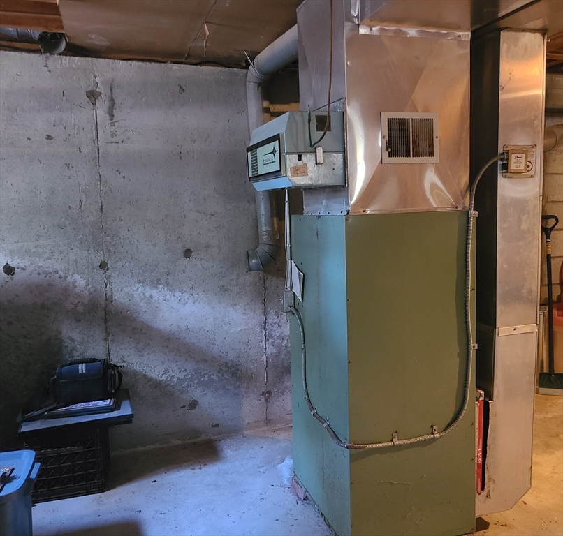 131 Holly Ridge Drive Hanson, MA 02341 - Photo 36 of 36 a bathroom with a sink and a mirror