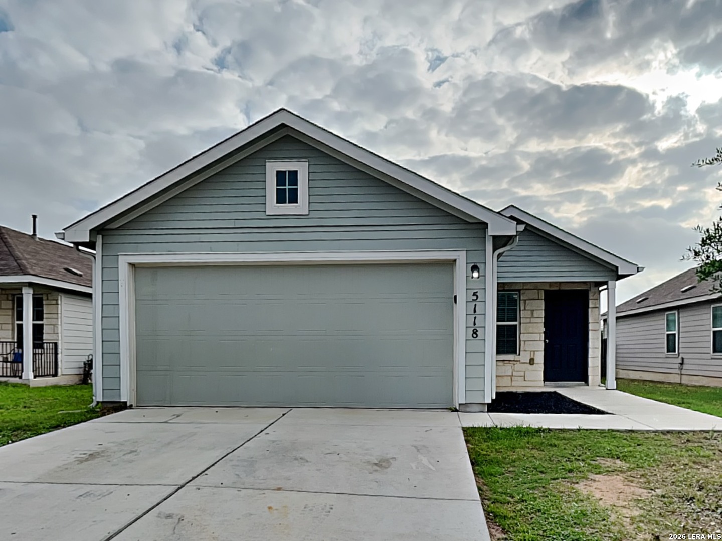 a front view of house with yard