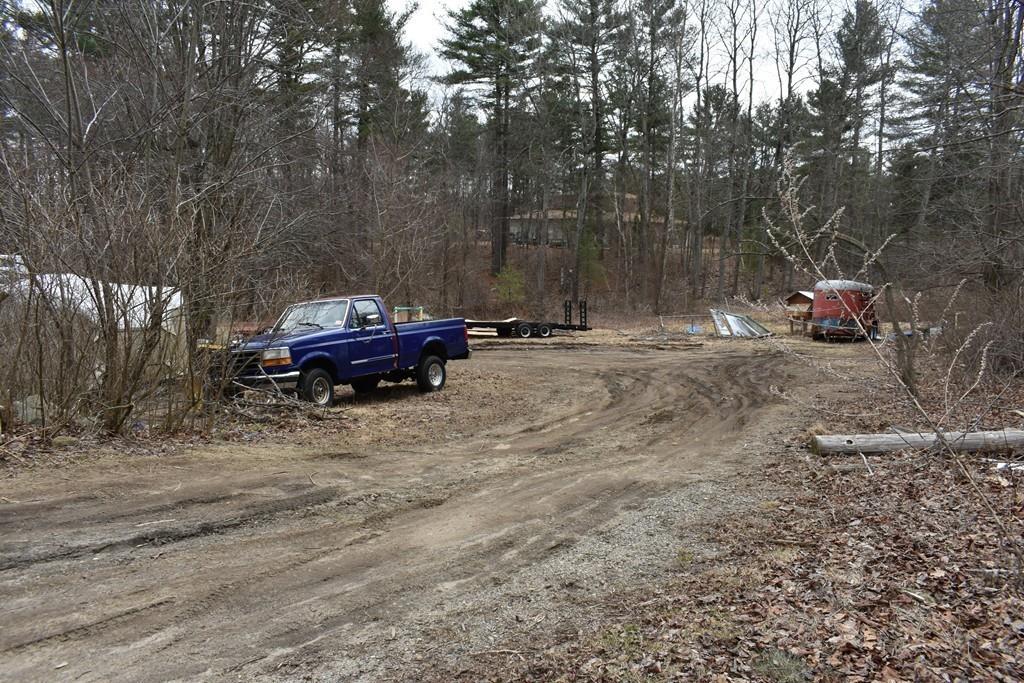 96 Fitchburg Road Townsend, MA 01469 - Photo 17 of 19 a backyard of a house with barbeque oven