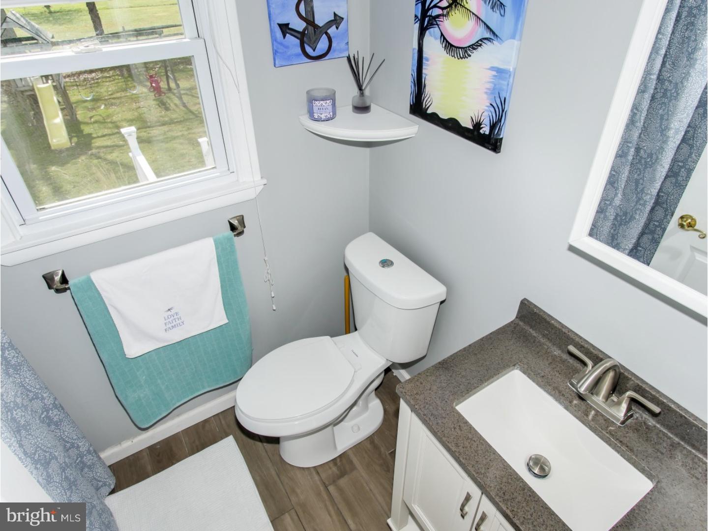 604 Exton Road Hatboro, PA 19040 - Photo 18 of 21 a white toilet sitting next to a bathroom sink