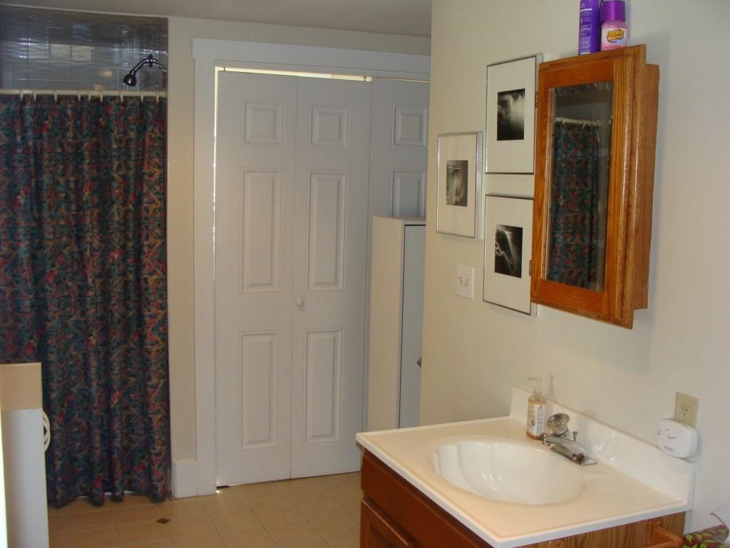 57 Clark Road York, ME 03909 - Photo 12 of 26 First floor bathroom with laundry.