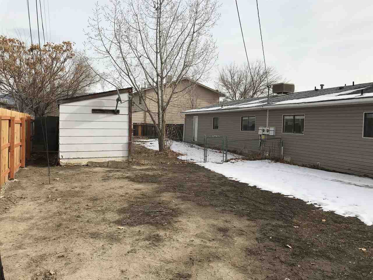 3240 D D 1/4 Road, Unit A&B Clifton, CO 81520 - Photo 19 of 19 a front view of a house with a yard