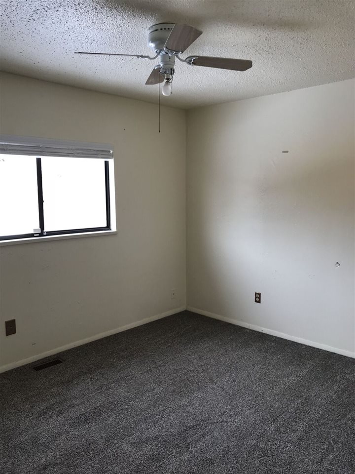 3240 D D 1/4 Road, Unit A&B Clifton, CO 81520 - Photo 7 of 19 an empty room with a window