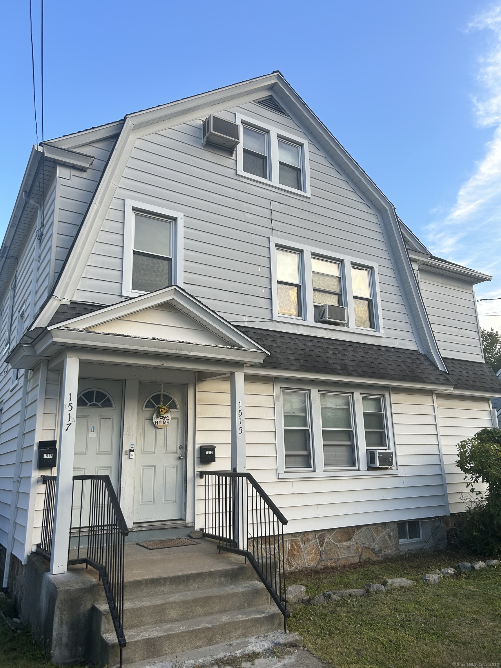 1515 Capitol Avenue Bridgeport, CT 06604 - Photo 13 of 17 a front view of a house with a yard