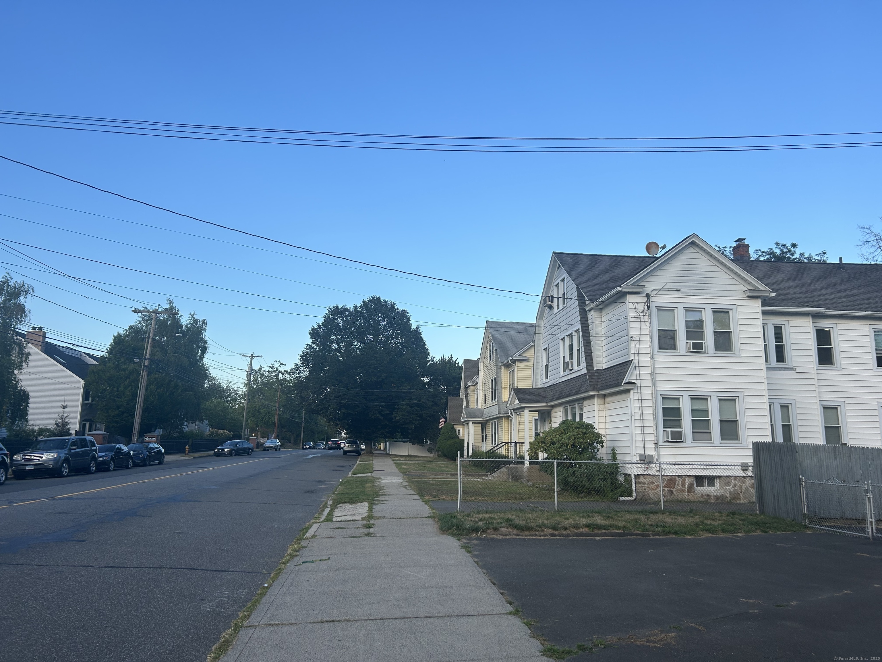 1515 Capitol Avenue Bridgeport, CT 06604 - Photo 15 of 17 a view of a white house with a street