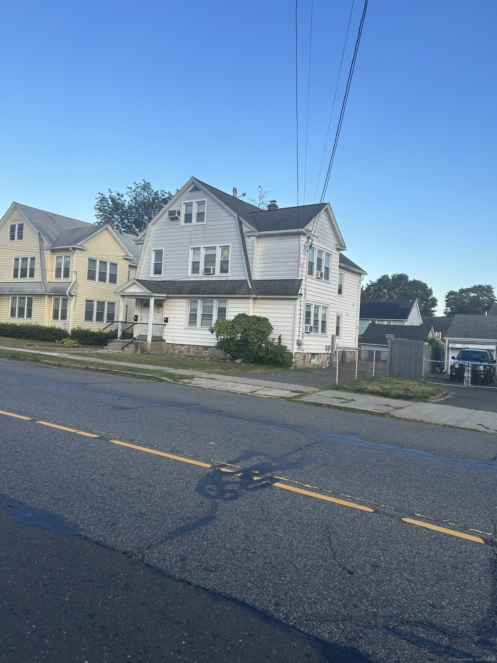 1515 Capitol Avenue Bridgeport, CT 06604 - Photo 16 of 17 a view of a city street both side of house