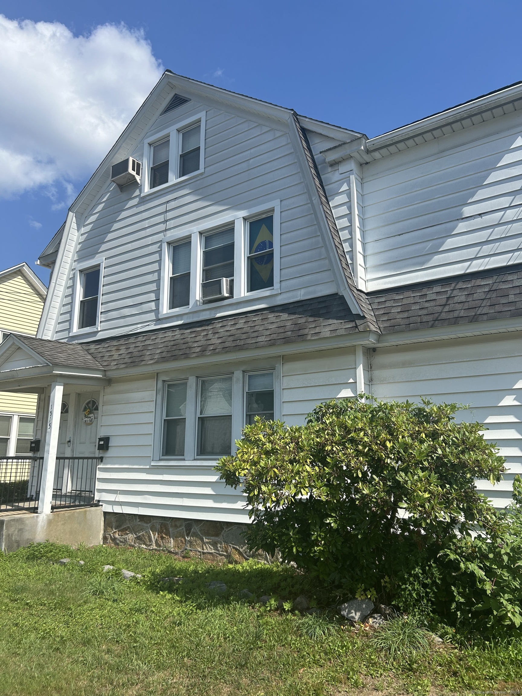 1515 Capitol Avenue Bridgeport, CT 06604 - Photo 5 of 17 a front view of a house with a yard