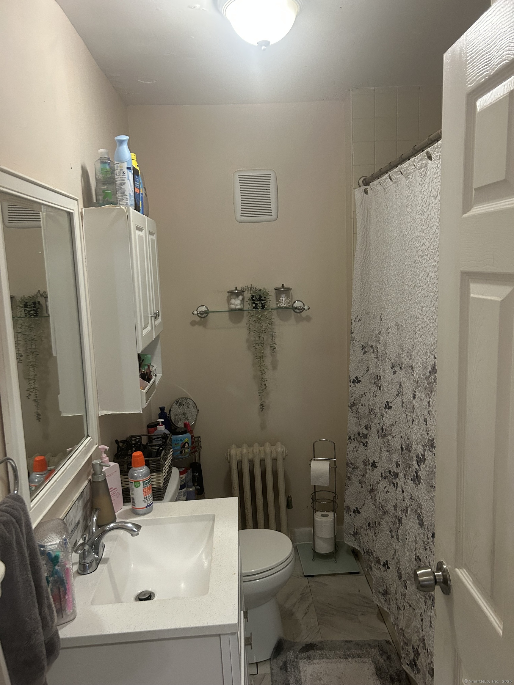 1515 Capitol Avenue Bridgeport, CT 06604 - Photo 9 of 17 a bathroom with a sink toilet and shower