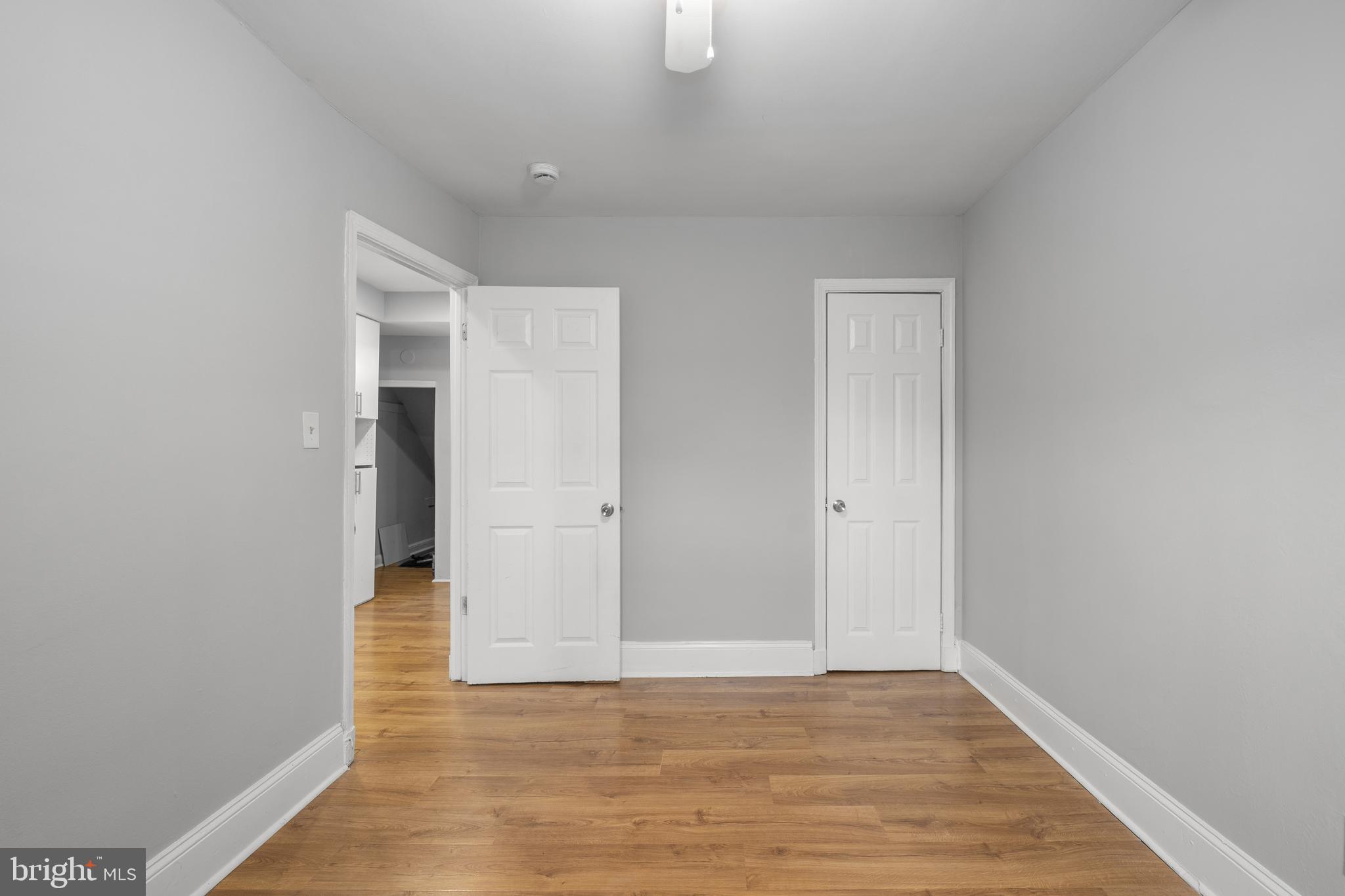 1238 Simms Place Northeast, Unit A Washington, DC 20002 - Photo 12 of 16 a view of an empty room and wooden floor