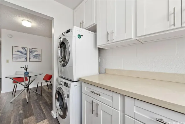 a utility room with dryer and washer