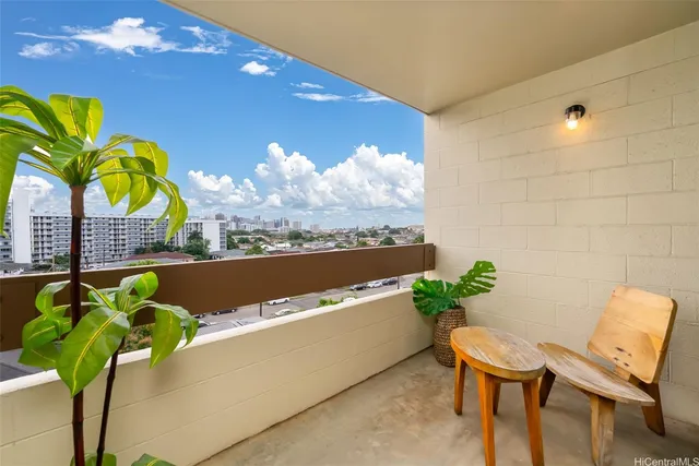 a view of a swimming pool with a lounge chair