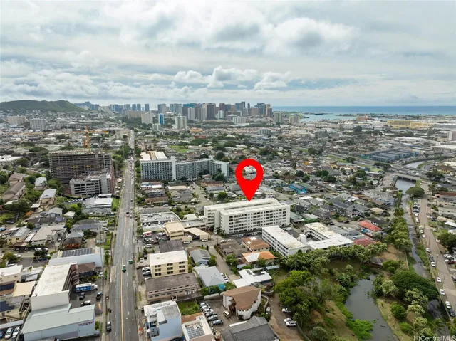 an aerial view of residential houses with outdoor space