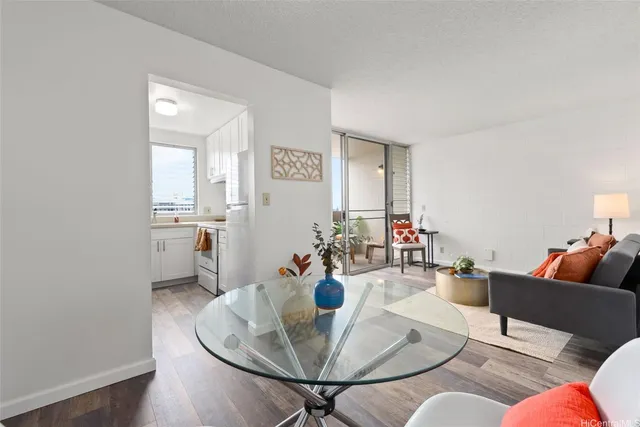 a living room with furniture and a table