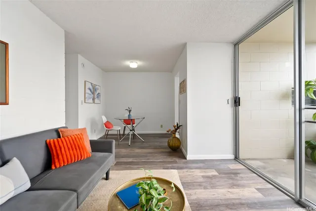 a living room with furniture and a table