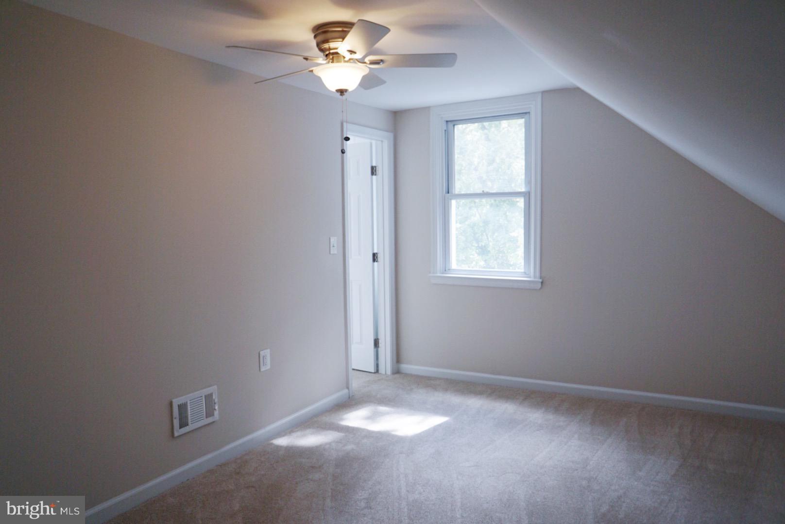 5215 Trumps Mill Road Baltimore, MD 21206 - Photo 18 of 27 UPPER LVL 3RD BEDROOM W/ WALK IN CLOSET