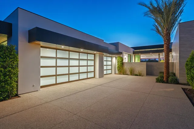 a view of a a dining room with furniture window and outside view