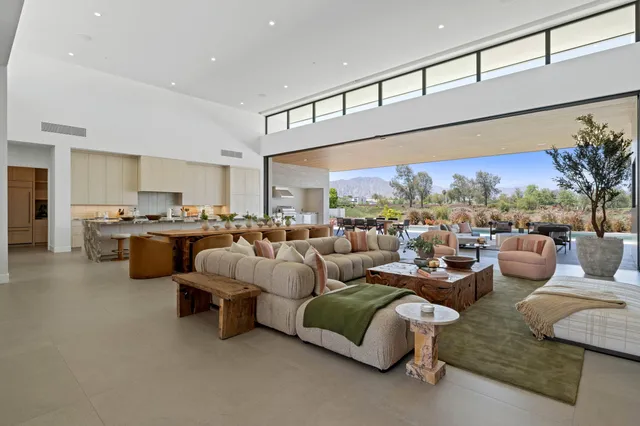 a bathroom with a glass shower door and a sink