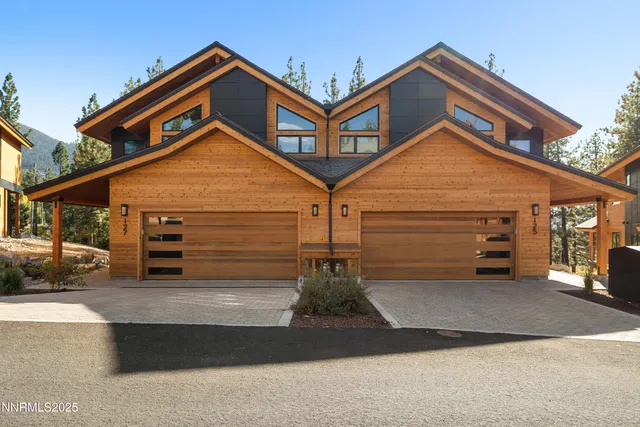 a front view of a house with garage