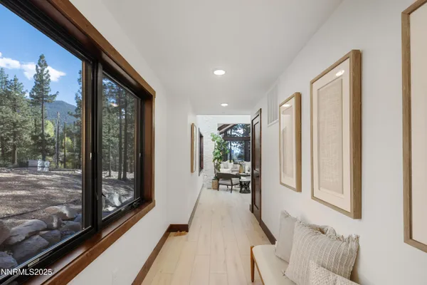 a view of a living room and a balcony