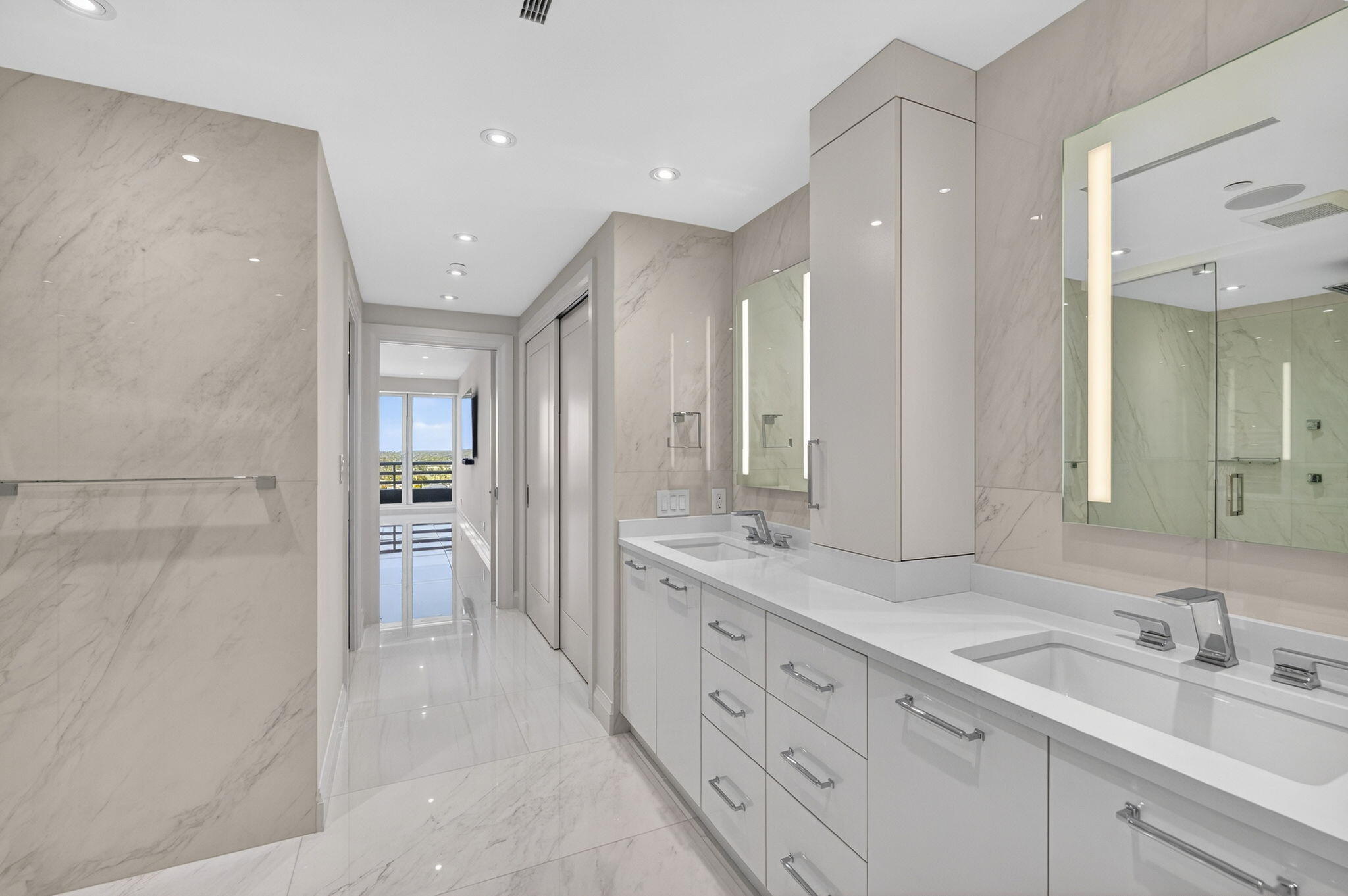 1500 South Ocean Boulevard, Unit 1602 Boca Raton, FL 33432 - Photo 31 of 88 a spacious bathroom with a double vanity sink mirror double shower and a