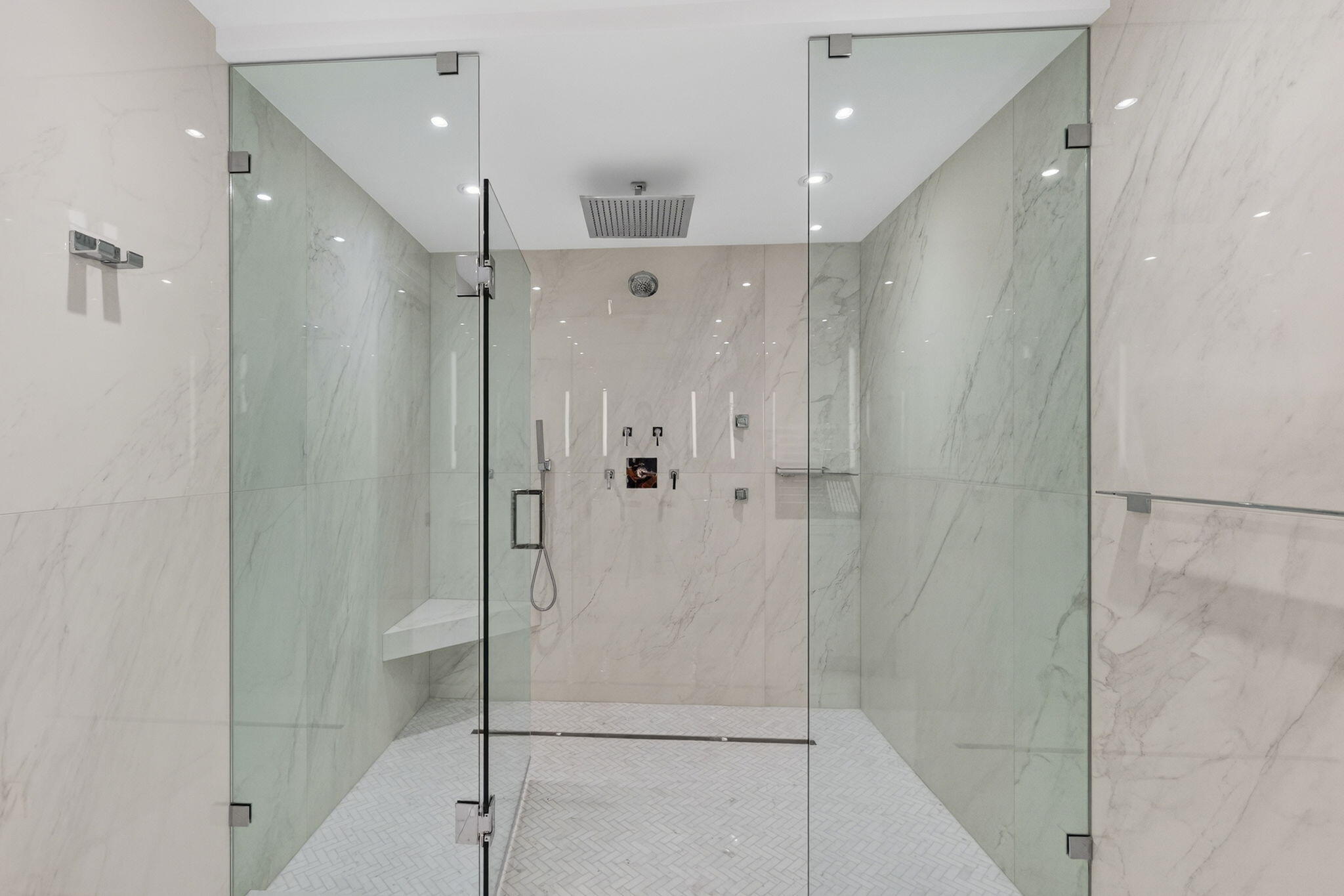 1500 South Ocean Boulevard, Unit 1602 Boca Raton, FL 33432 - Photo 34 of 88 a bathroom with a shower and a glass door