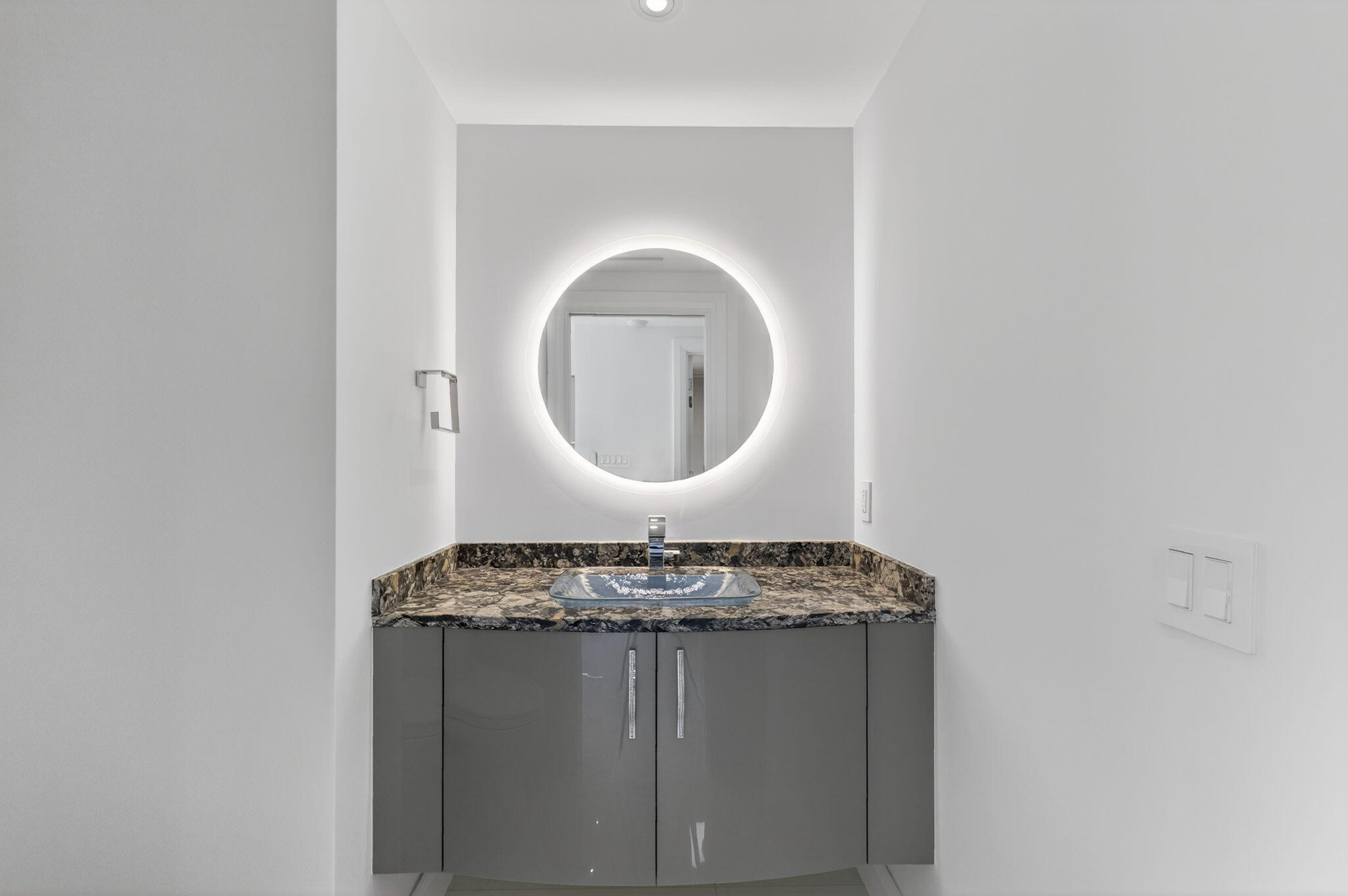 1500 South Ocean Boulevard, Unit 1602 Boca Raton, FL 33432 - Photo 46 of 88 a bathroom with a granite countertop sink and a mirror