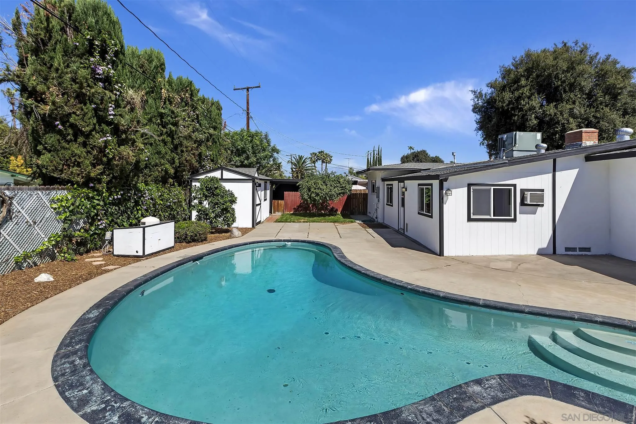 2956 Ronald Street Riverside, CA 92506 - Photo 23 of 28 an outdoor view with swimming pool