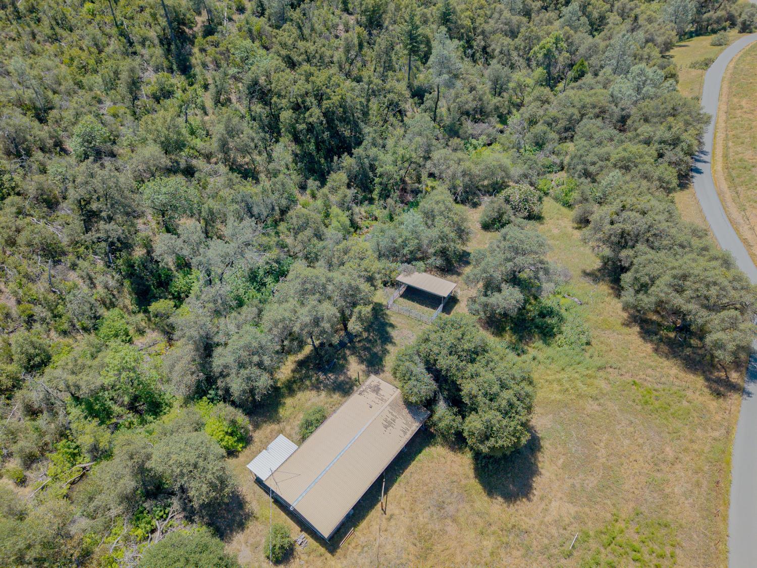 5912 Old Gulch Road San Andreas, CA 95249 - Photo 69 of 71 an aerial view of a house with a yard