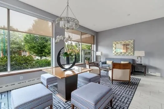 a living room with furniture and a window