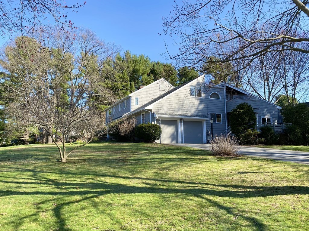 5 Spring Valley Road Belmont, MA 02478 - Photo 1 of 40 a house view with swimming pool in front of it