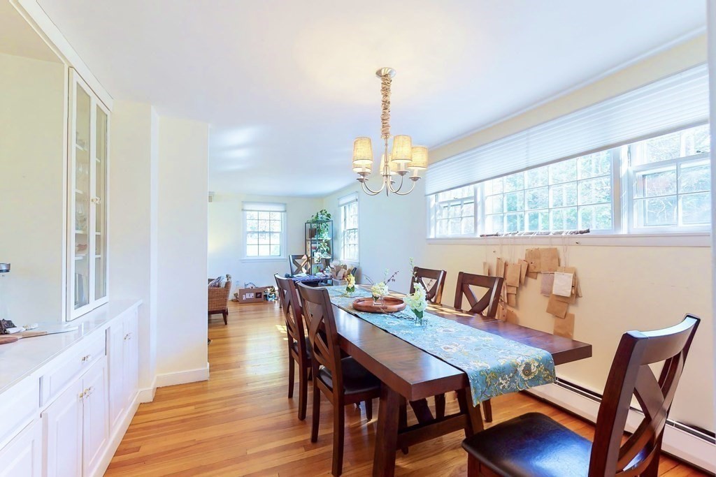5 Spring Valley Road Belmont, MA 02478 - Photo 9 of 40 a view of a dining room with furniture window and wooden floor