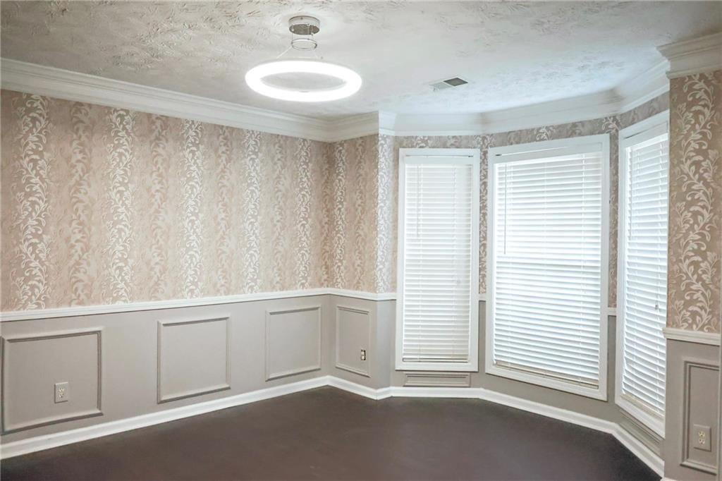 5964 Springfair Run Lithonia, GA 30038 - Photo 17 of 40 a view of an empty room with a window