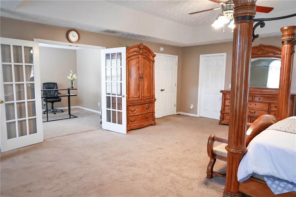 5964 Springfair Run Lithonia, GA 30038 - Photo 21 of 40 a view of a livingroom with furniture and a window