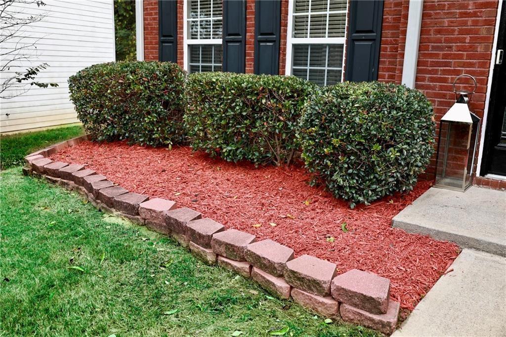 5964 Springfair Run Lithonia, GA 30038 - Photo 40 of 40 a view of a backyard with plants