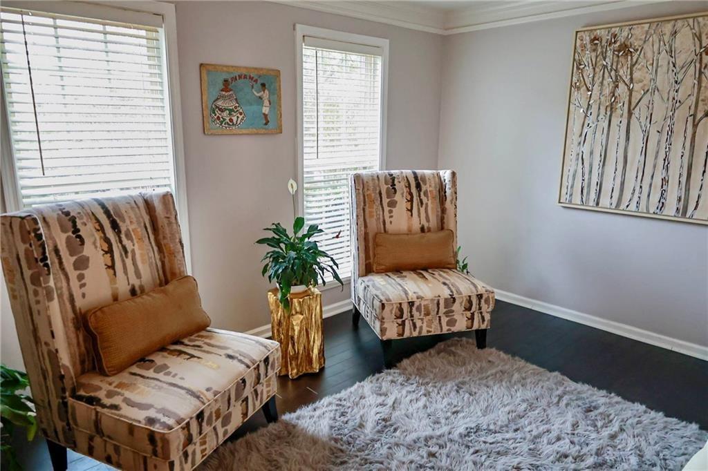 5964 Springfair Run Lithonia, GA 30038 - Photo 8 of 40 a living room with furniture and a window