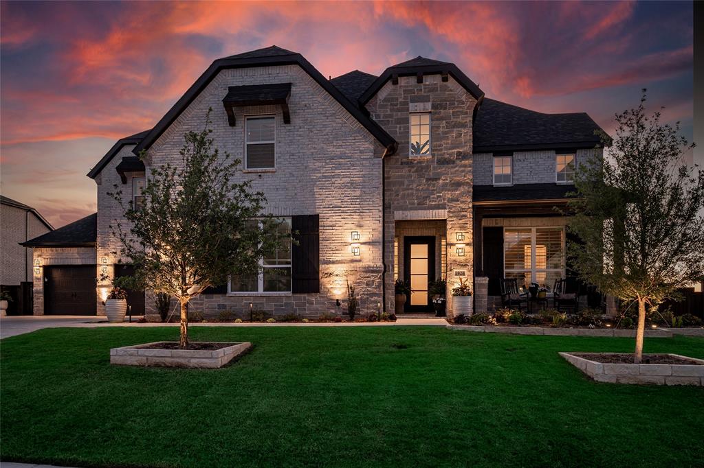 1920 Lotus Court Haslet, TX 76052 - Photo 3 of 40 Meticulously maintained yard and home, custom lighting at the exterior.