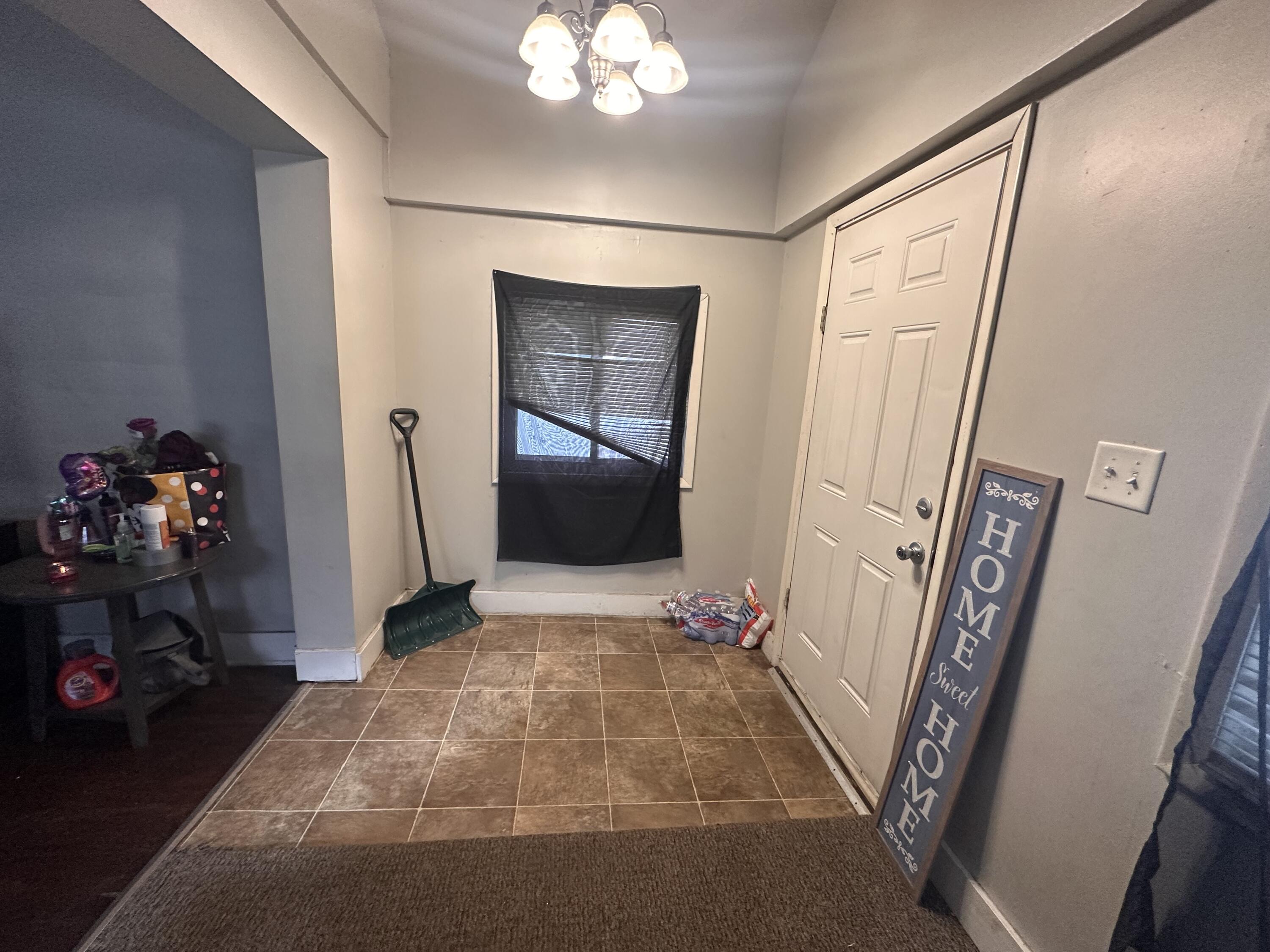 3756 Tyler Street Gary, IN 46408 - Photo 5 of 12 a view of a hallway in a house