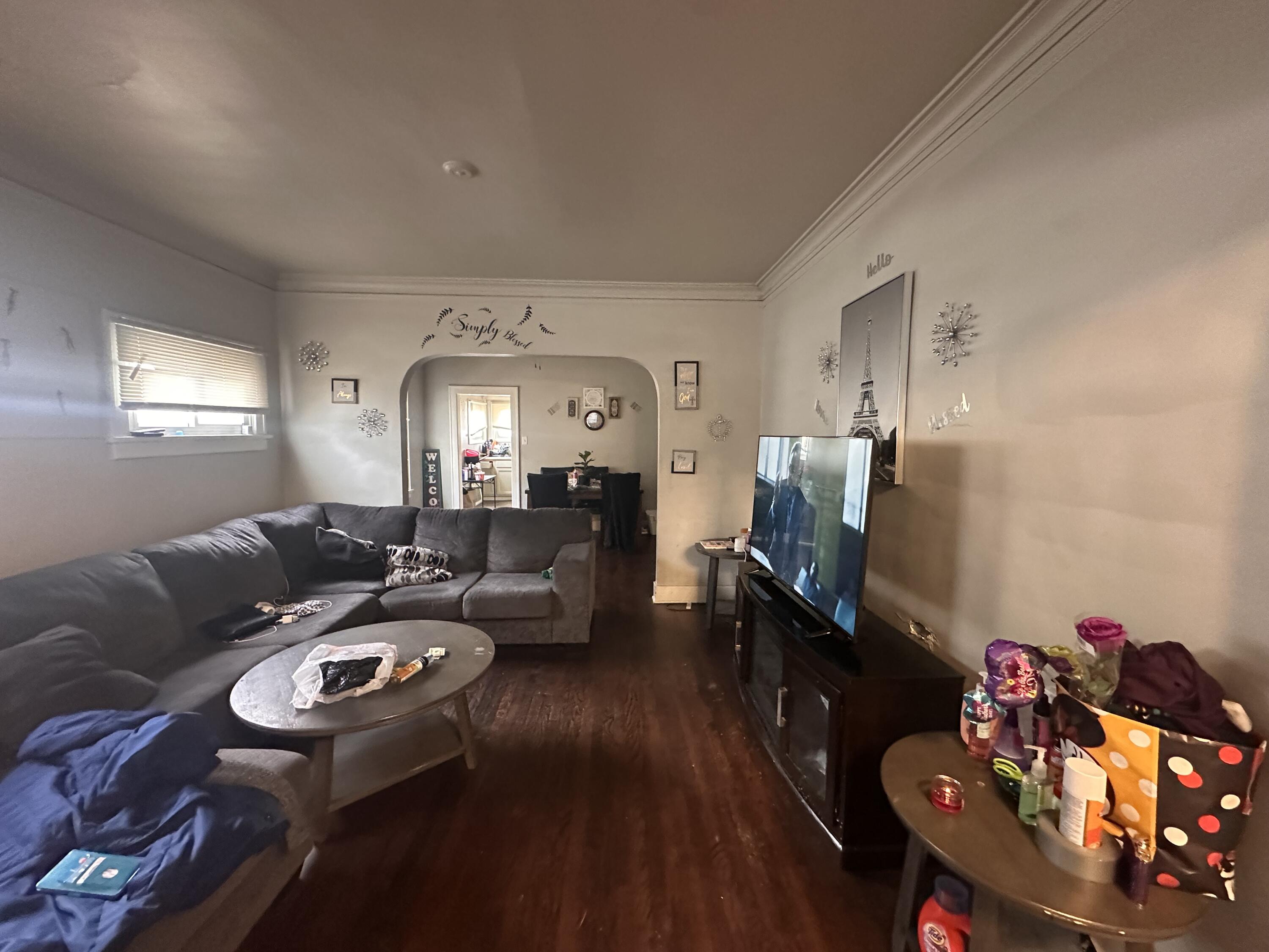 3756 Tyler Street Gary, IN 46408 - Photo 6 of 12 a living room with furniture and a flat screen tv