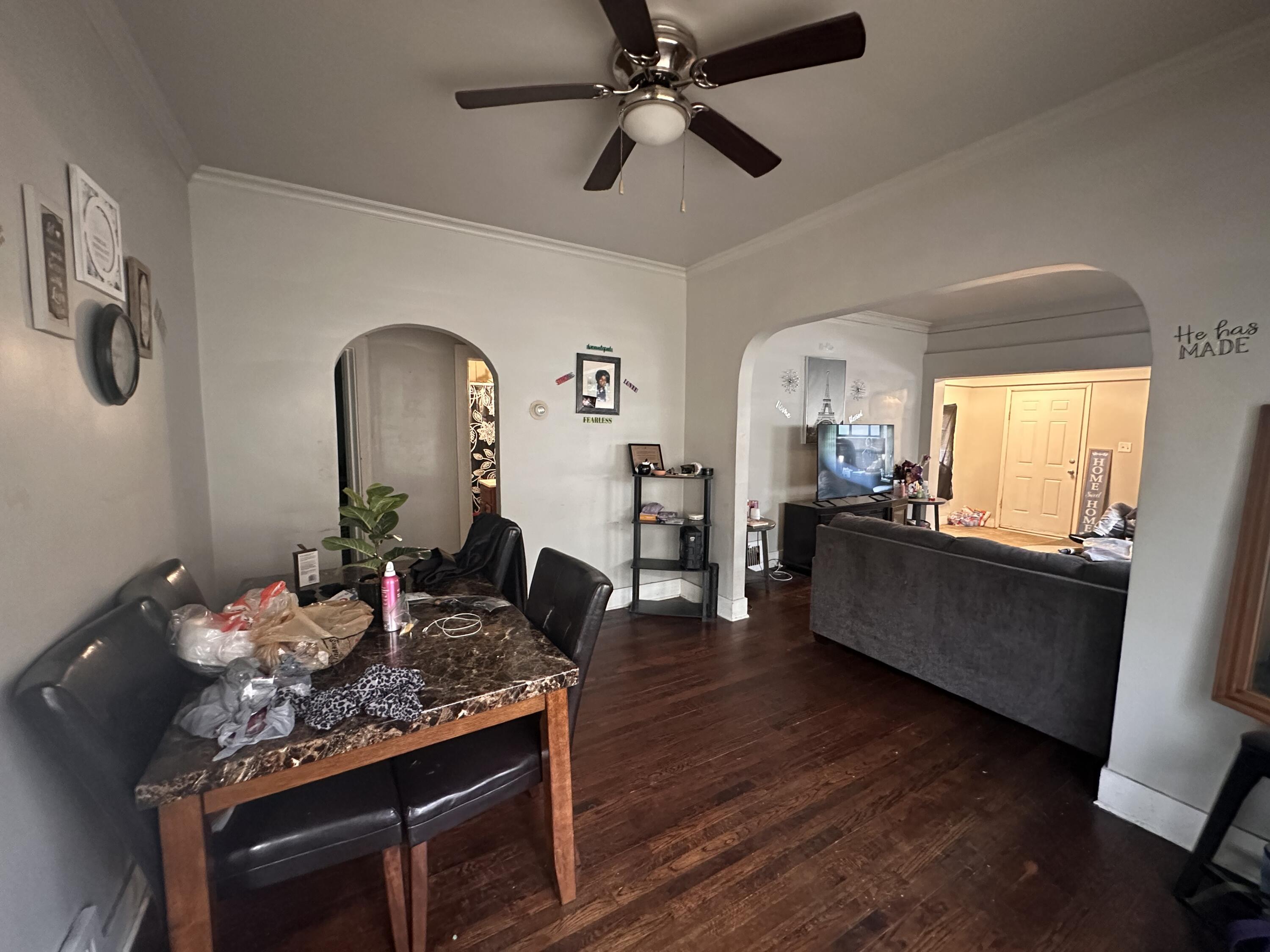 3756 Tyler Street Gary, IN 46408 - Photo 7 of 12 a living room with furniture and a wooden floor