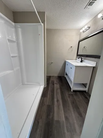 a view of utility room with empty racks