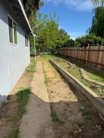 a view of backyard with green space