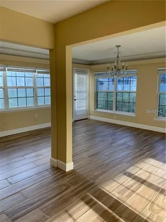 a view of livingroom with wooden floor